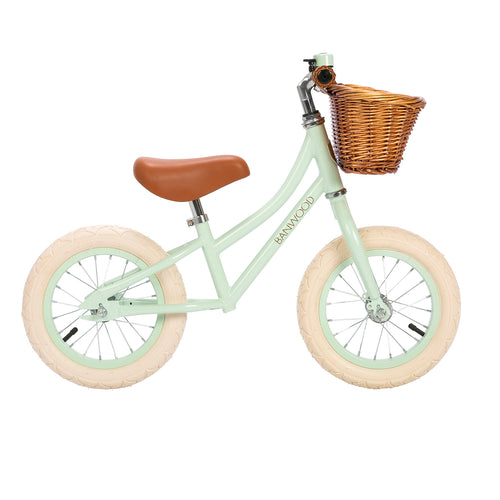 balance bike with basket and mint frame
