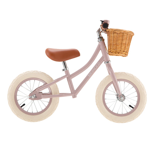 balance bike with basket and dusty rose frame