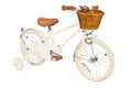 Children's bicycle with a basket on a white background
