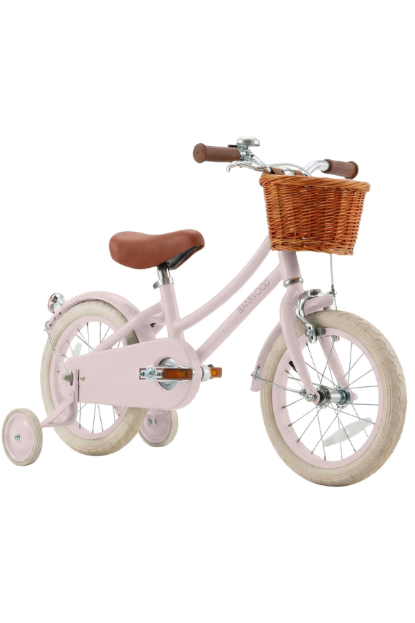 small pink bicycle for kids with training wheels and basket